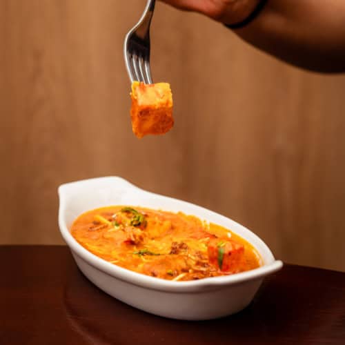 Paneer tikka masala, a creamy vegetarian curry served at our Indian vegetarian restaurant in Lisbon.